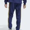 Adidas Originals Adicolor Classics+ Sst - Trainingsbroek - Dark Blue Crew Yellow