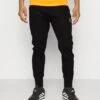 EA7 Emporio Armani Train Soccer Pants - Trainingsbroek - Black 15 EA7 Emporio Armani Train Soccer Pants - Trainingsbroek - Black -Next Verkoopwinkel 5a0ce17b4b1e44c69c2be8782dd5356d