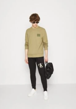 Calvin Klein Jeans Spray Pant - Trainingsbroek - Black 7 Calvin Klein Jeans Spray Pant - Trainingsbroek - Black -Next Verkoopwinkel 7308cb9514994995871d44370b0231cc